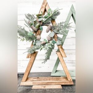 Rustic Holiday Tree with Greenery and Pinecones
